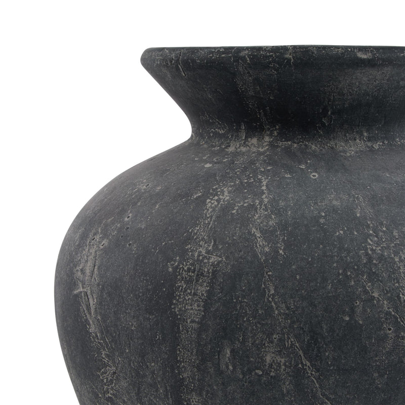Close-up of the weathered charcoal grey surface