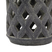 Close-up of the weathered grey lattice and base
