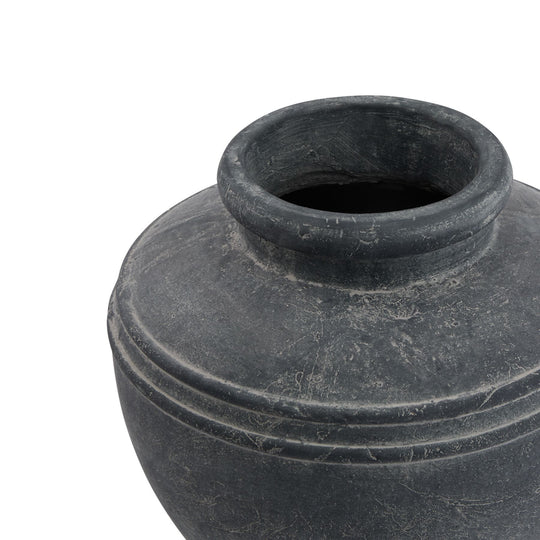Close-up of the water pot's wide neck