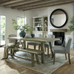 Amalfi grey water pot with olive branches on a dining table
