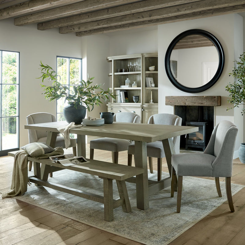 Amalfi grey water pot with olive branches on a dining table
