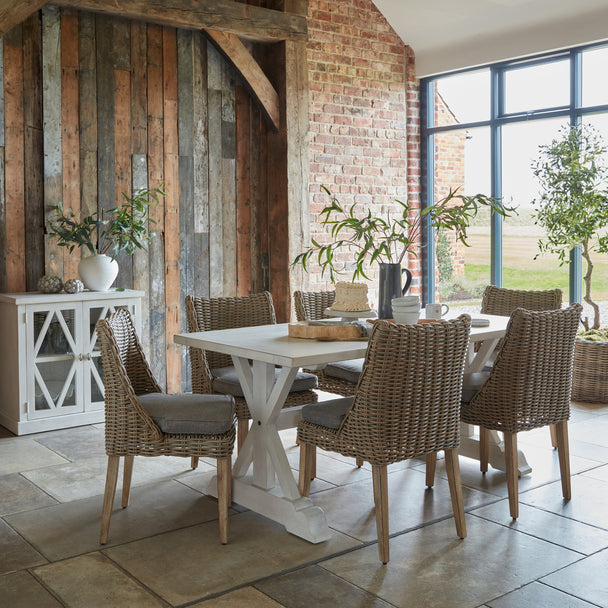 Amalfi woven chairs around a white dining table