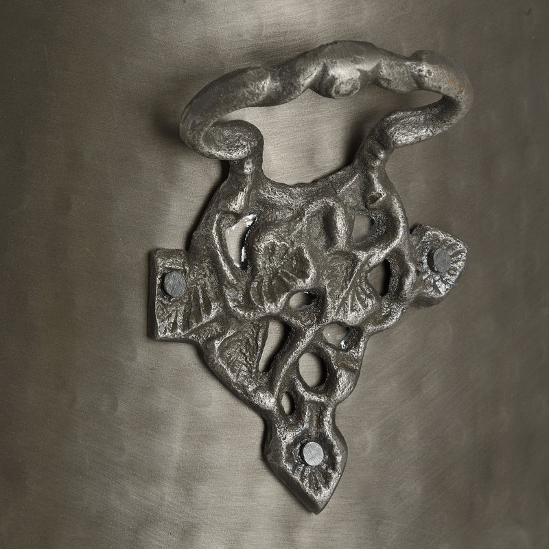 Close-up of the ornate cast side mount