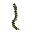 Artificial pine garland with pinecones hanging at full length