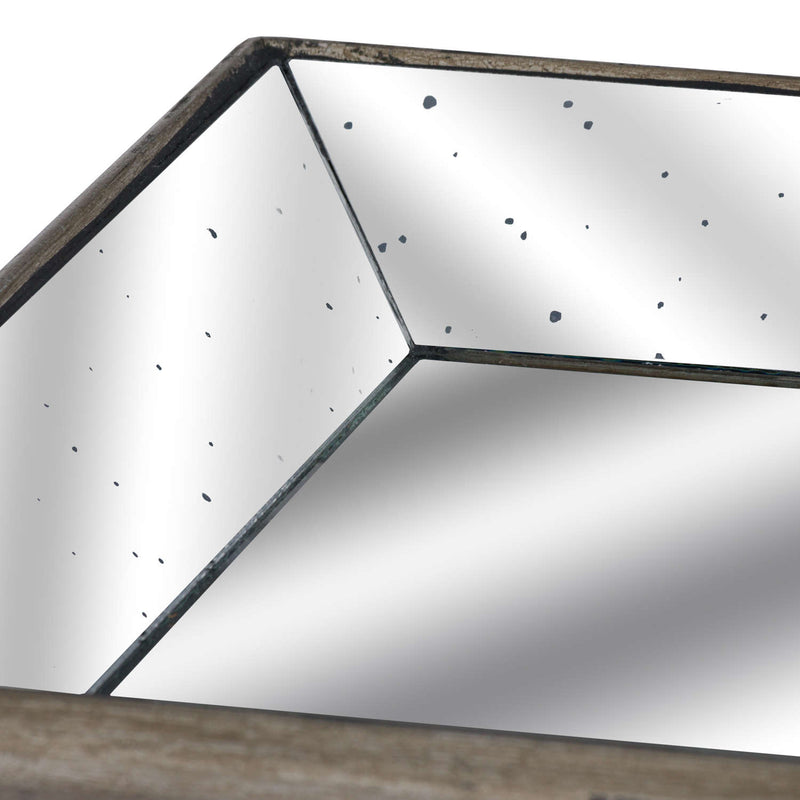 Close-up of the distressed mirrored corner