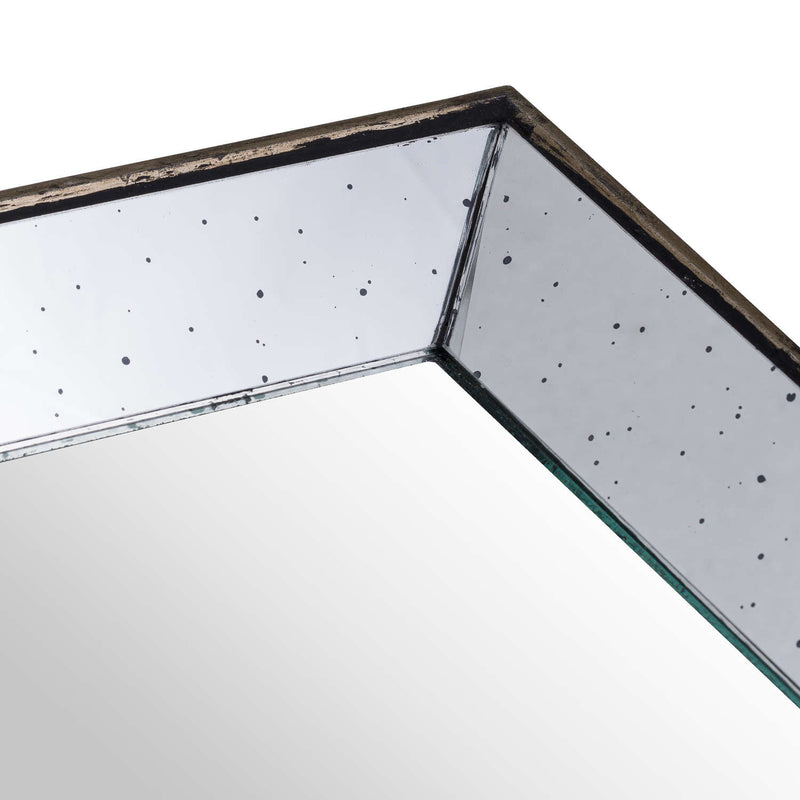 Close-up of the distressed mirror corner and wooden edge