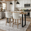 Two mist grey bar stools at a kitchen island