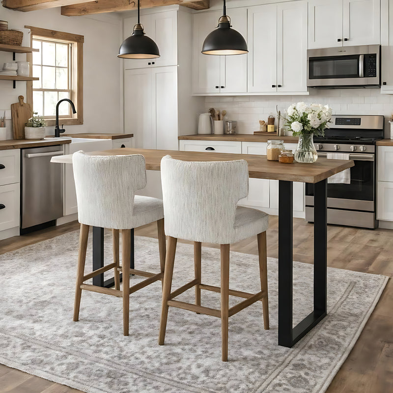 Two mist grey bar stools at a kitchen island