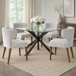 Avia mist grey chairs around a round glass dining table
