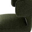 Close-up of the curved back and moss green fabric
