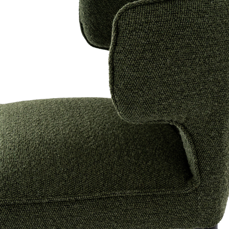 Close-up of the curved back and moss green fabric