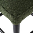 Close-up of the seat edge and black leg