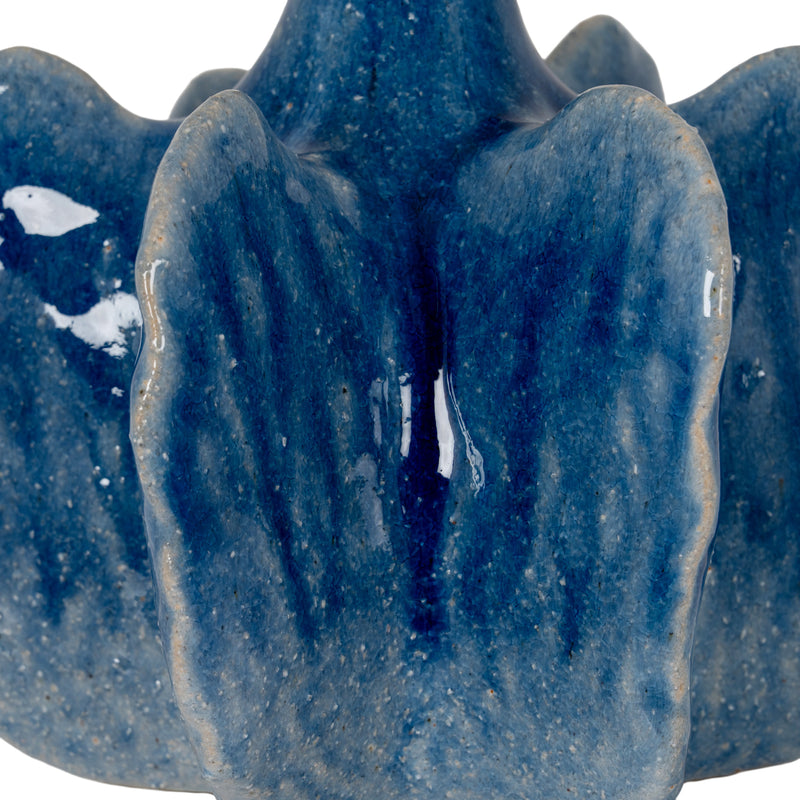Close-up of the glossy blue glaze on the lobes