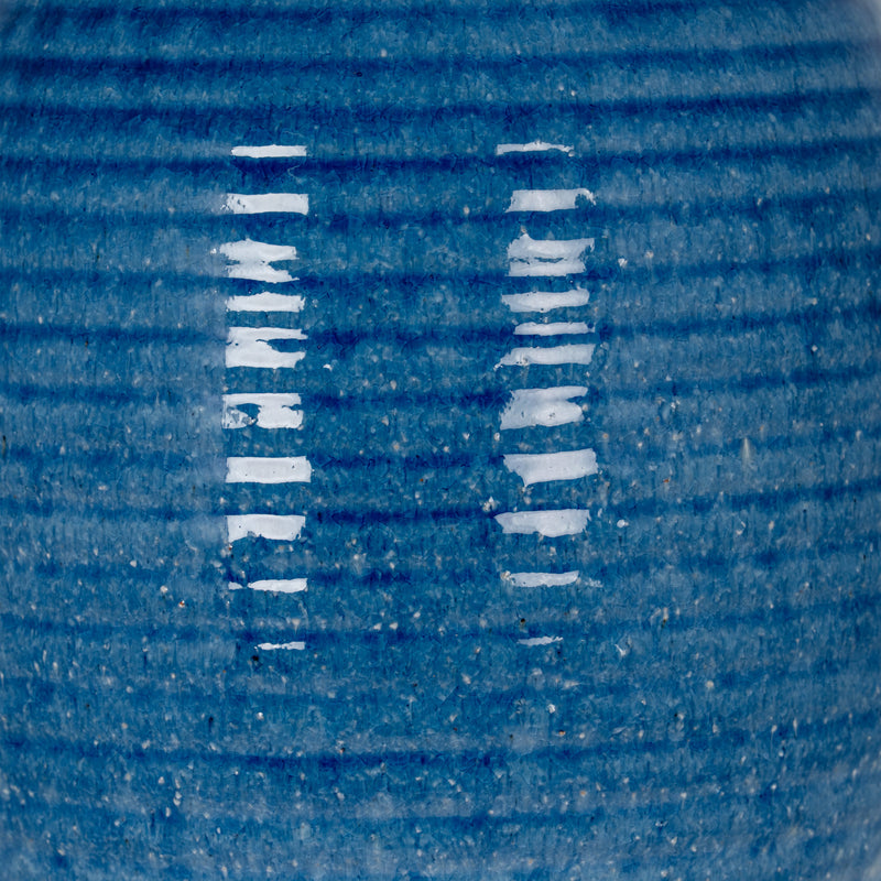 Close-up of the ribbed blue glaze
