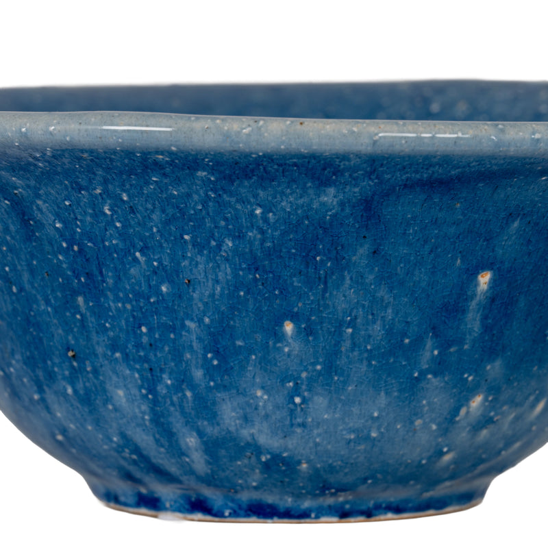Close-up of the speckled blue glaze