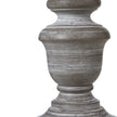 Close-up of the turned urn base and distressed grey finish