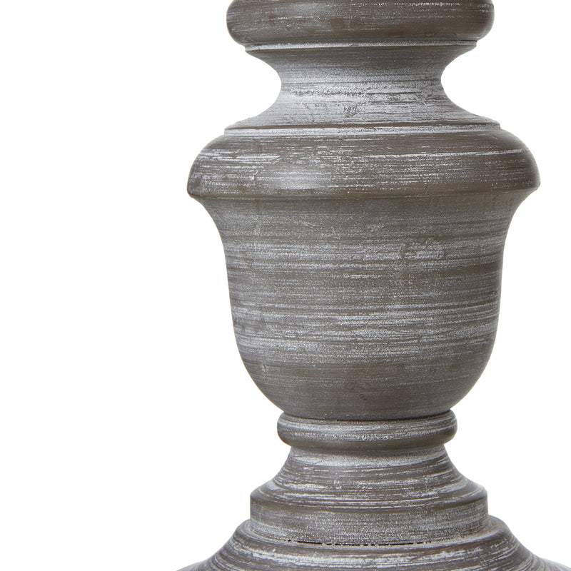 Close-up of the turned urn base and distressed grey finish