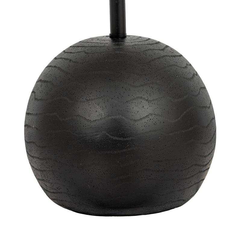 Close-up of the black cannonball base