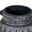 Inside rim and handle of the black etched pot