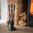 Black Fireside Companion Set with Duchess Top – 41cm, companion set next to a log store and wood burner