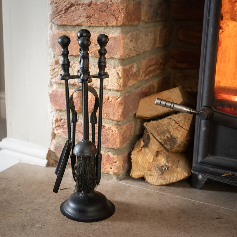 Black Fireside Companion Set with Duchess Top – 41cm, companion set next to a log store and wood burner
