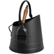 Black coal bucket with the shovel inside