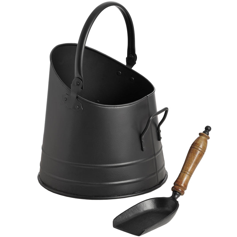 Black coal bucket with the teak handle shovel beside it