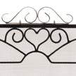 Close-up of the heart scrollwork and chrome scroll crest