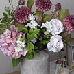 Close-up of a floral display in the Bloomville vase