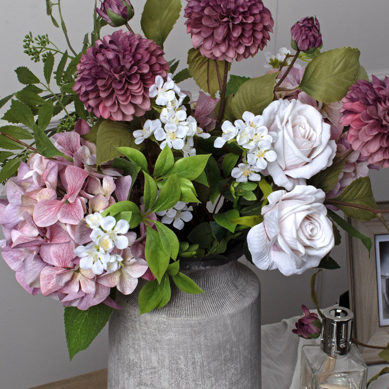 Close-up of a floral display in the Bloomville vase