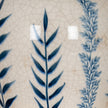 Close-up of the blue leaf pattern on cream crackle glaze