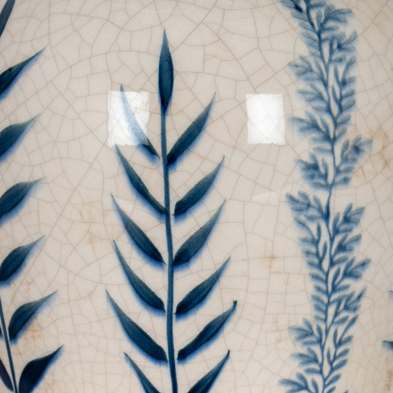 Close-up of the blue leaf pattern on cream crackle glaze