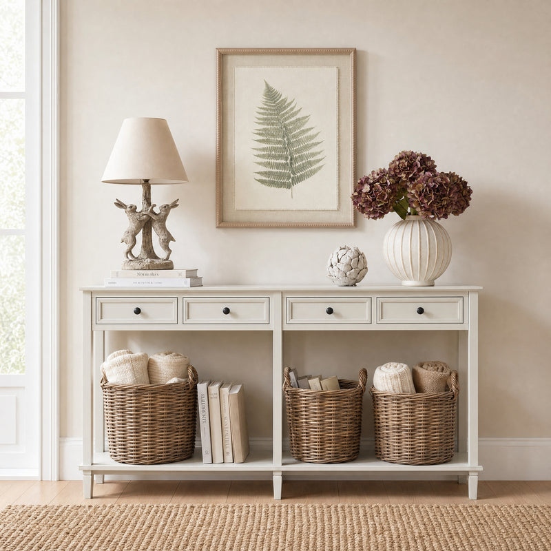 Bracken framed art above a white console table