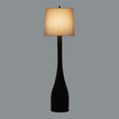 Brompton floor lamp switched on against a grey background