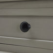 Close-up of a black drawer knob