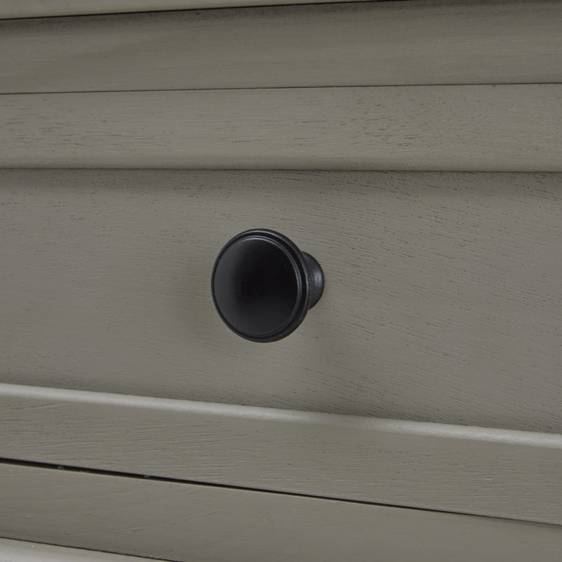 Close-up of a black drawer knob