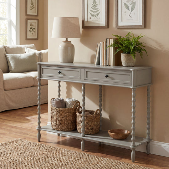 Camden console with baskets and a lamp in a living room