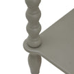 Close-up of a bobbin-turned leg