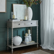 Camden console with vases against a teal wall
