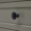 close-up of the black drawer knob