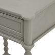 close-up of the shaped top and panelled drawer