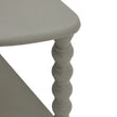 Close-up of the curved shelf and leg