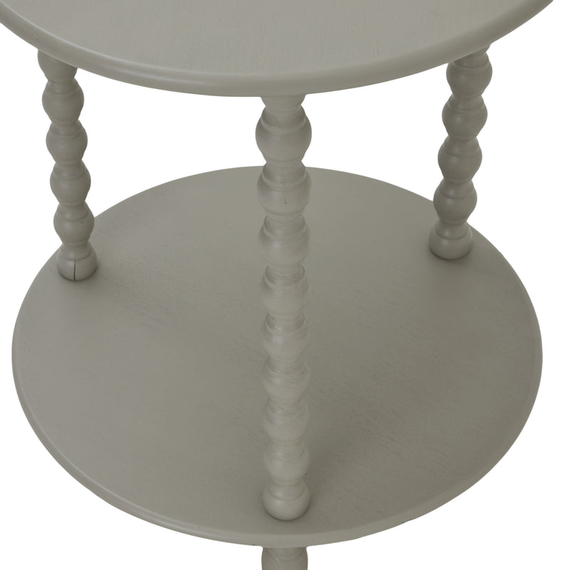 close-up of the lower shelf and turned legs