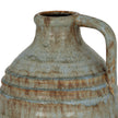 Close-up of the handle and rusty streaked glaze