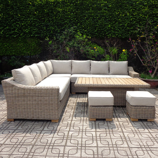 Capri corner sofa set with riser table and stools on a patterned terrace