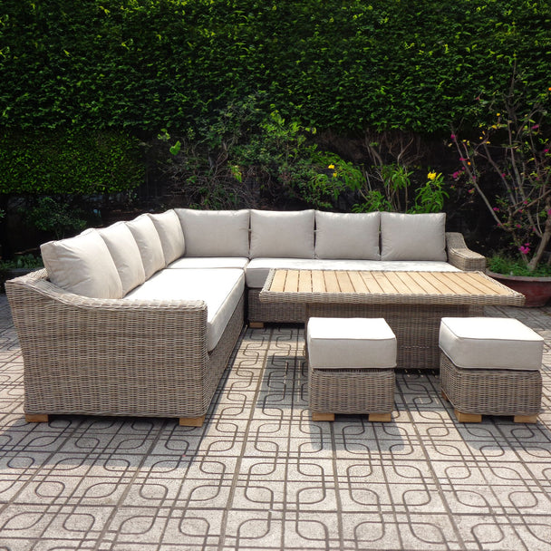 Capri corner sofa set with riser table and stools on a patterned terrace