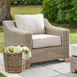 Capri wicker armchair on a garden terrace