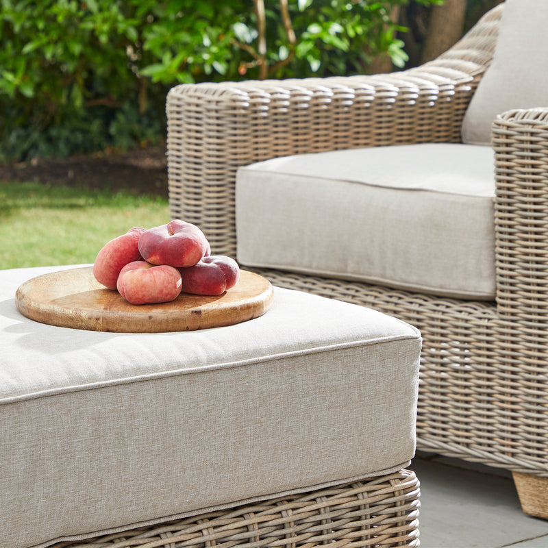 tray of fruit on the Capri footstool cushion