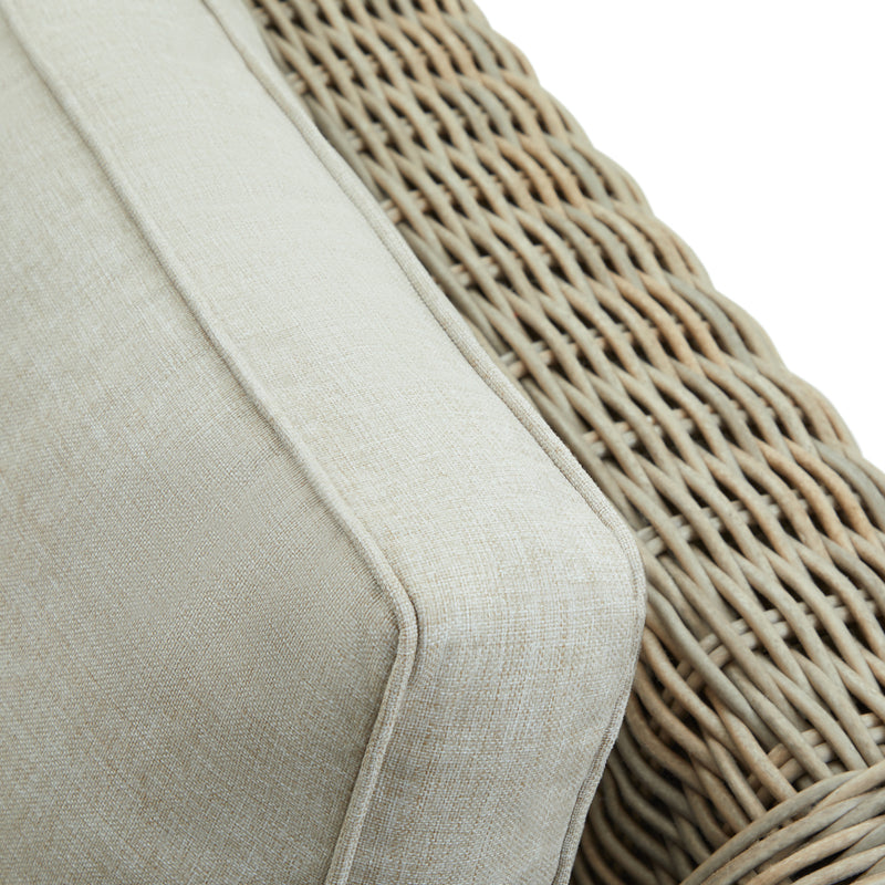 close-up of the rounded wicker arm