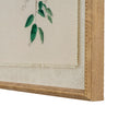 Close-up of the frayed linen panel and beaded frame corner